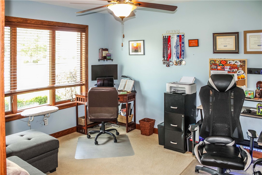 9 South Country Club Road Mattoon, IL 61938 - Photo 18 of 20 a view of a workspace with furniture and a window