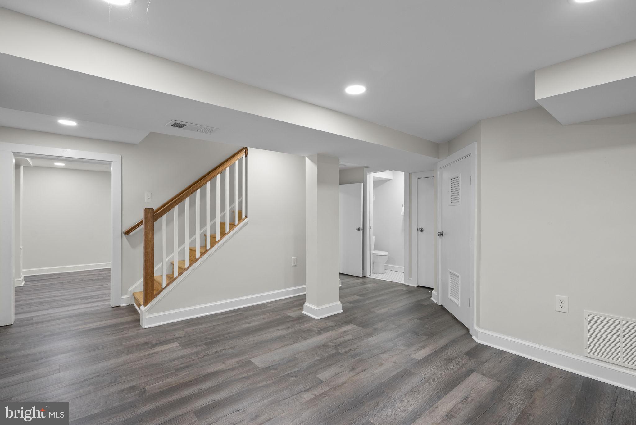 9407 Seminole Street Silver Spring, MD 20901 - Photo 42 of 59 Renovated Lower Level with Vinyl Flooring