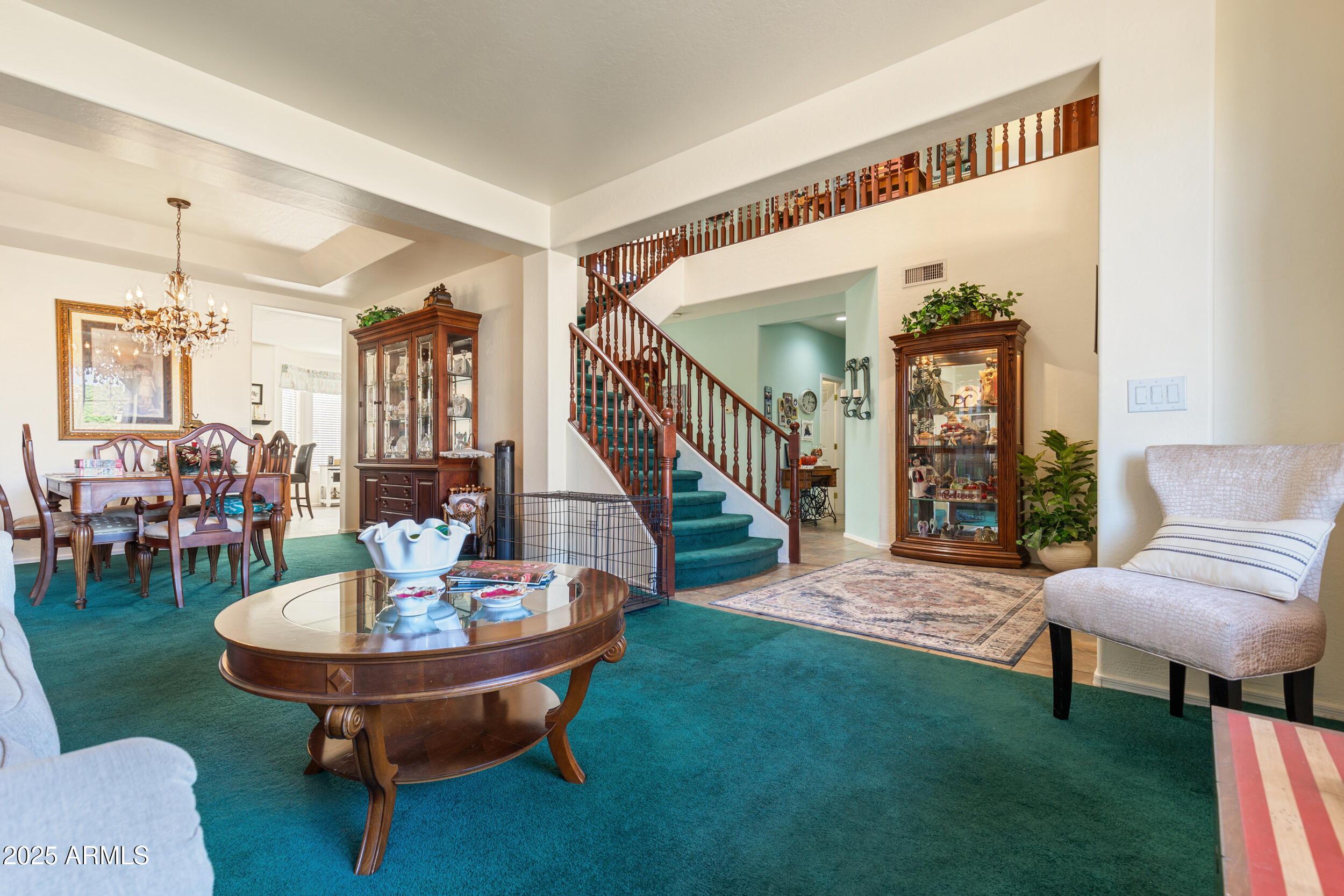 2821 East Nunneley Road Gilbert, AZ 85296 - Photo 10 of 51 a living room with furniture and a table