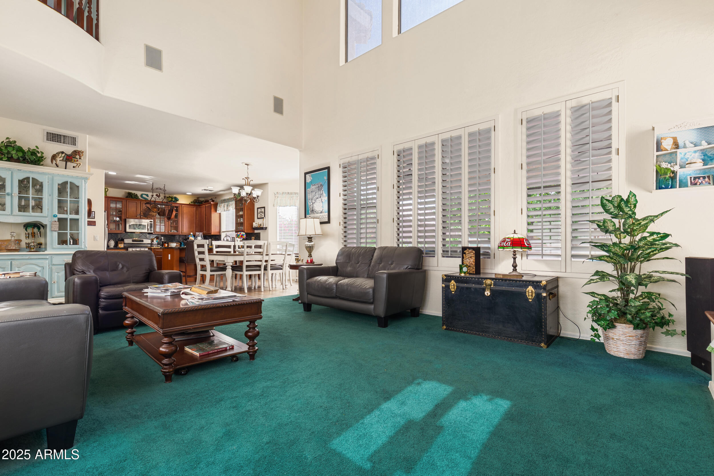 2821 East Nunneley Road Gilbert, AZ 85296 - Photo 19 of 51 a living room with furniture and a fireplace