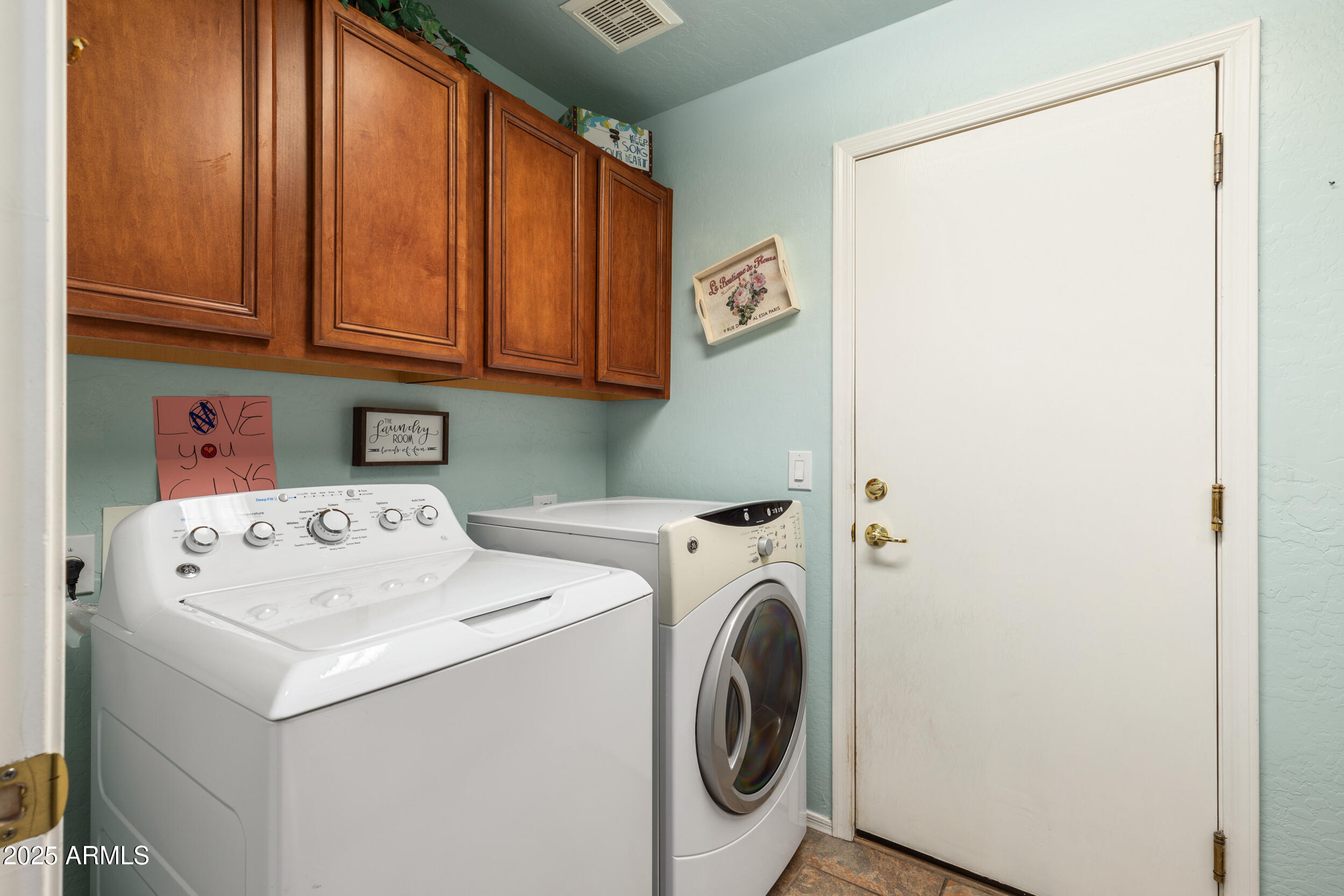 2821 East Nunneley Road Gilbert, AZ 85296 - Photo 22 of 51 a utility room with dryer and washer
