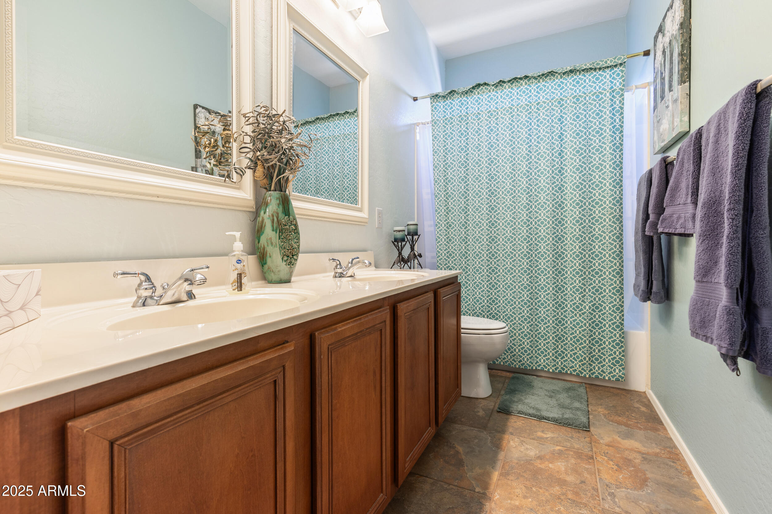 2821 East Nunneley Road Gilbert, AZ 85296 - Photo 28 of 51 a bathroom with a double vanity sink toilet and shower