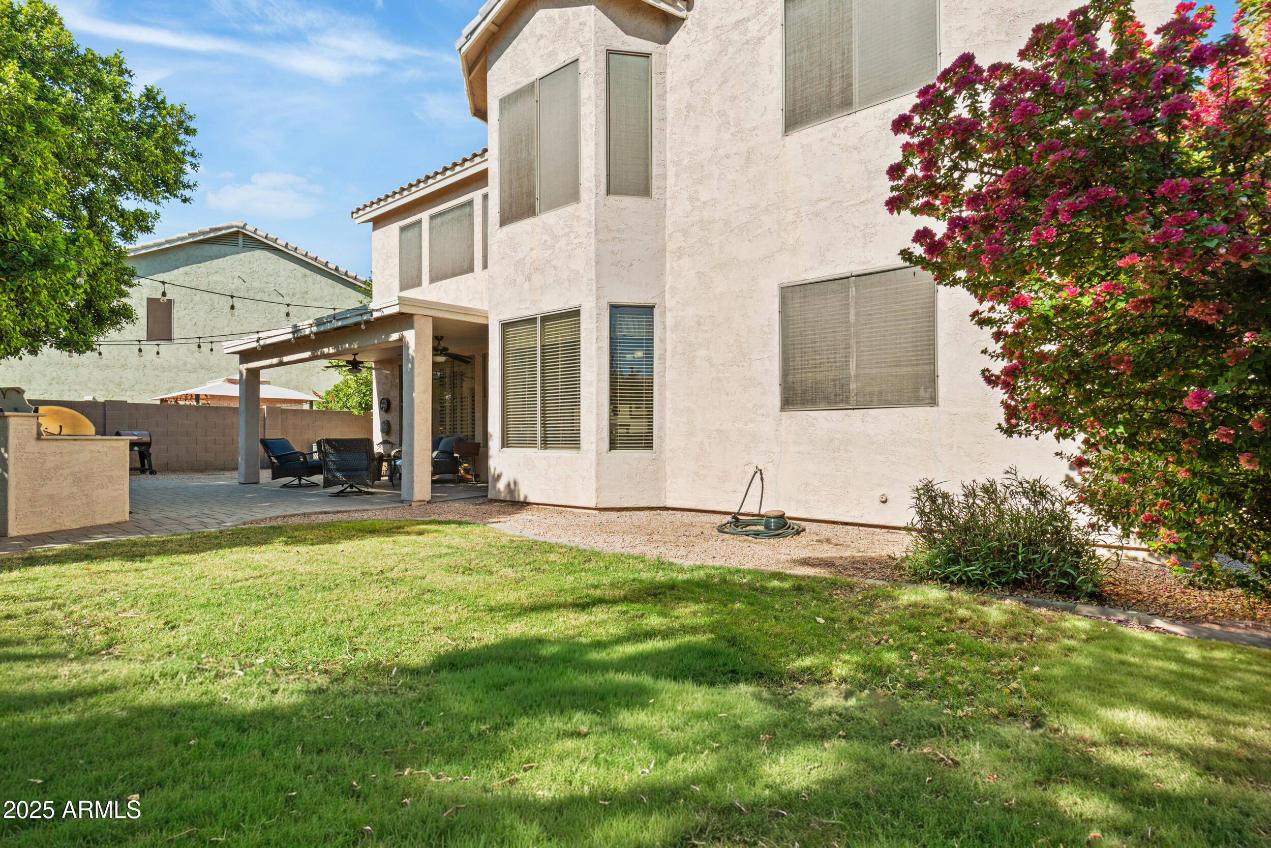 2821 East Nunneley Road Gilbert, AZ 85296 - Photo 42 of 51 a view of a house with backyard and sitting area