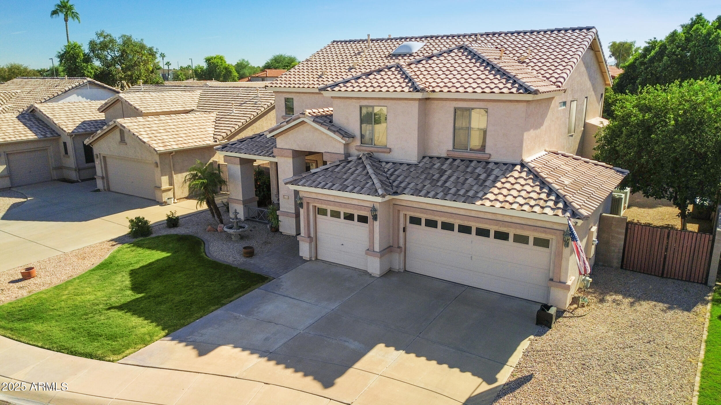 2821 East Nunneley Road Gilbert, AZ 85296 - Photo 45 of 51 a front view of a house with a yard