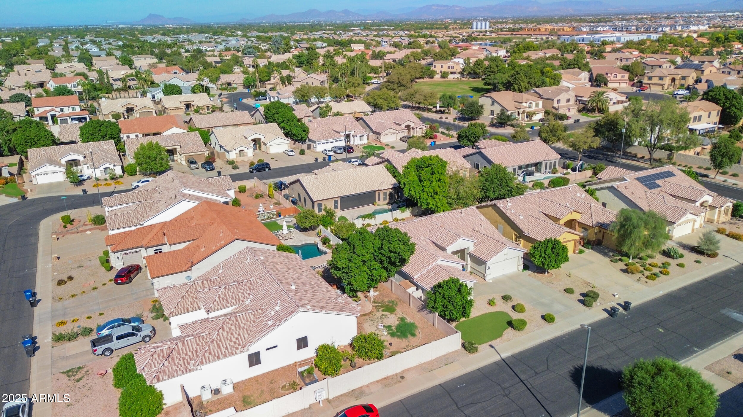 2821 East Nunneley Road Gilbert, AZ 85296 - Photo 47 of 51 an aerial view of residential houses with outdoor space
