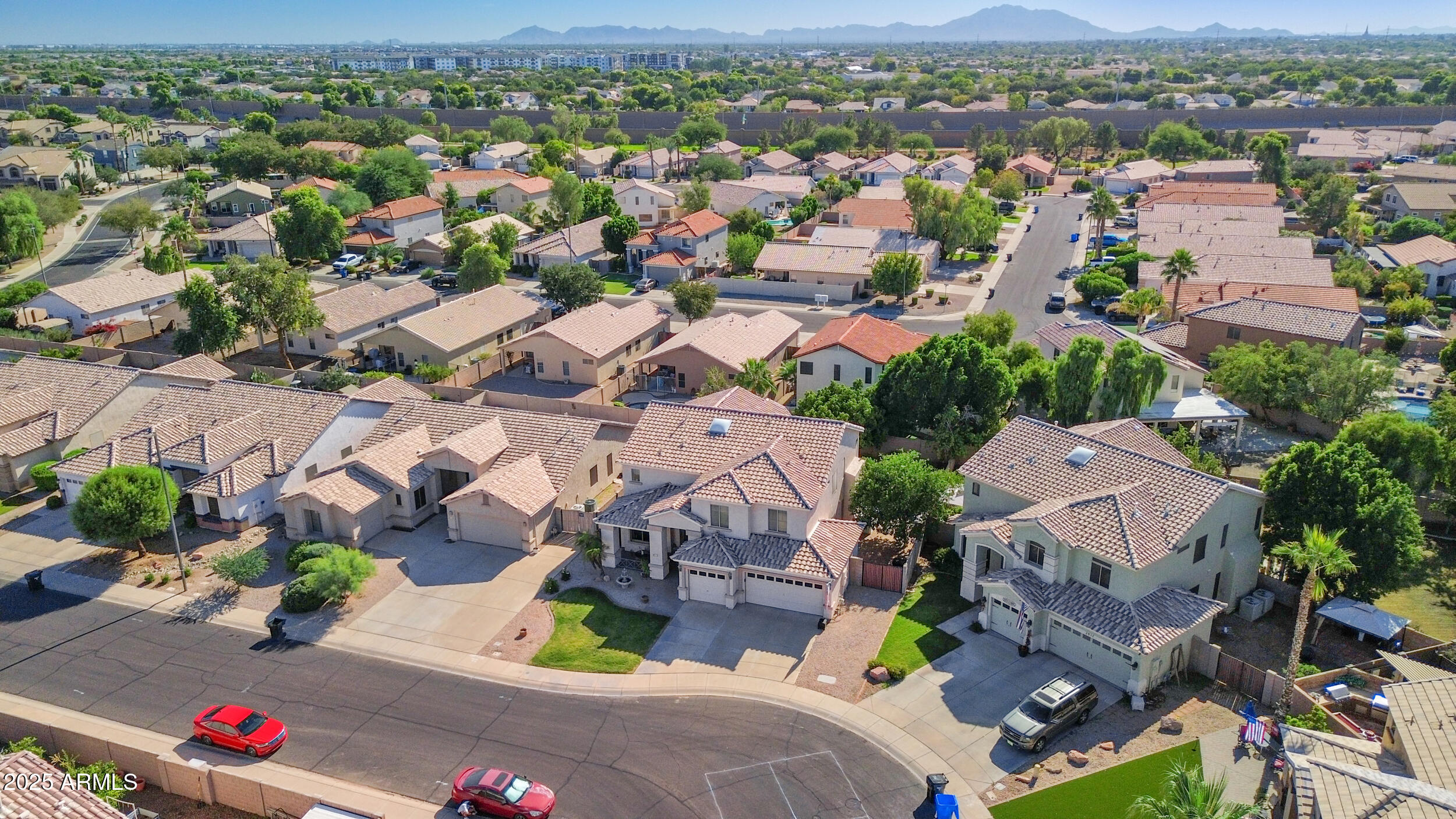 2821 East Nunneley Road Gilbert, AZ 85296 - Photo 48 of 51 an aerial view of a houses with a city view