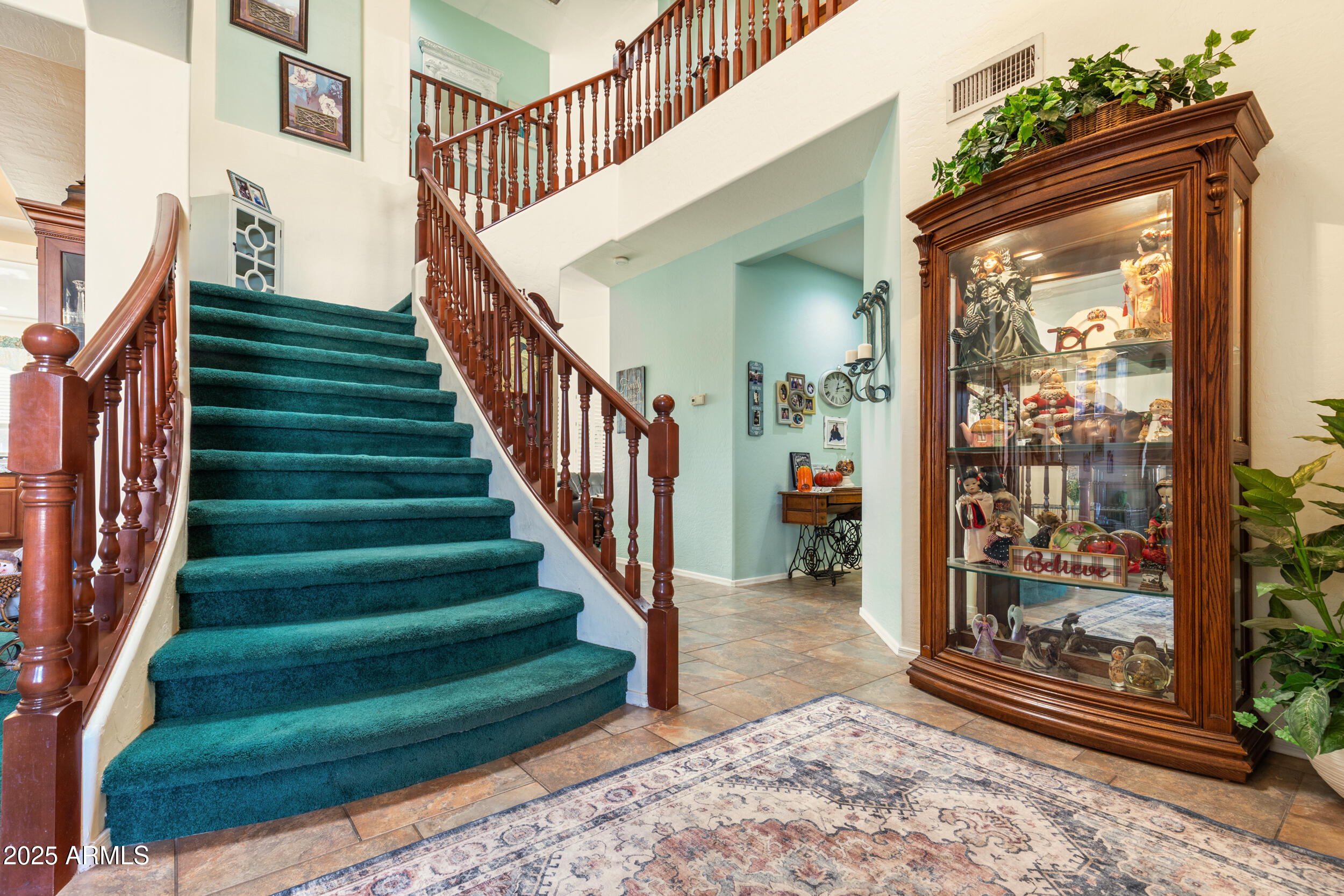 2821 East Nunneley Road Gilbert, AZ 85296 - Photo 7 of 51 a view of entryway and hall with wooden floor