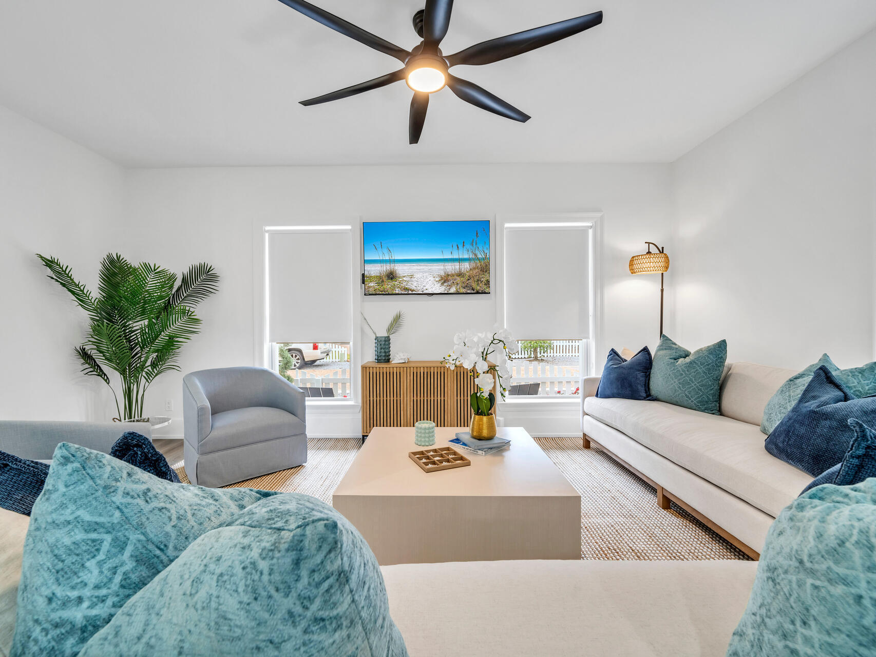 84 Mark Street Destin, FL 32541 - Photo 19 of 81 a living room with furniture and a potted plant