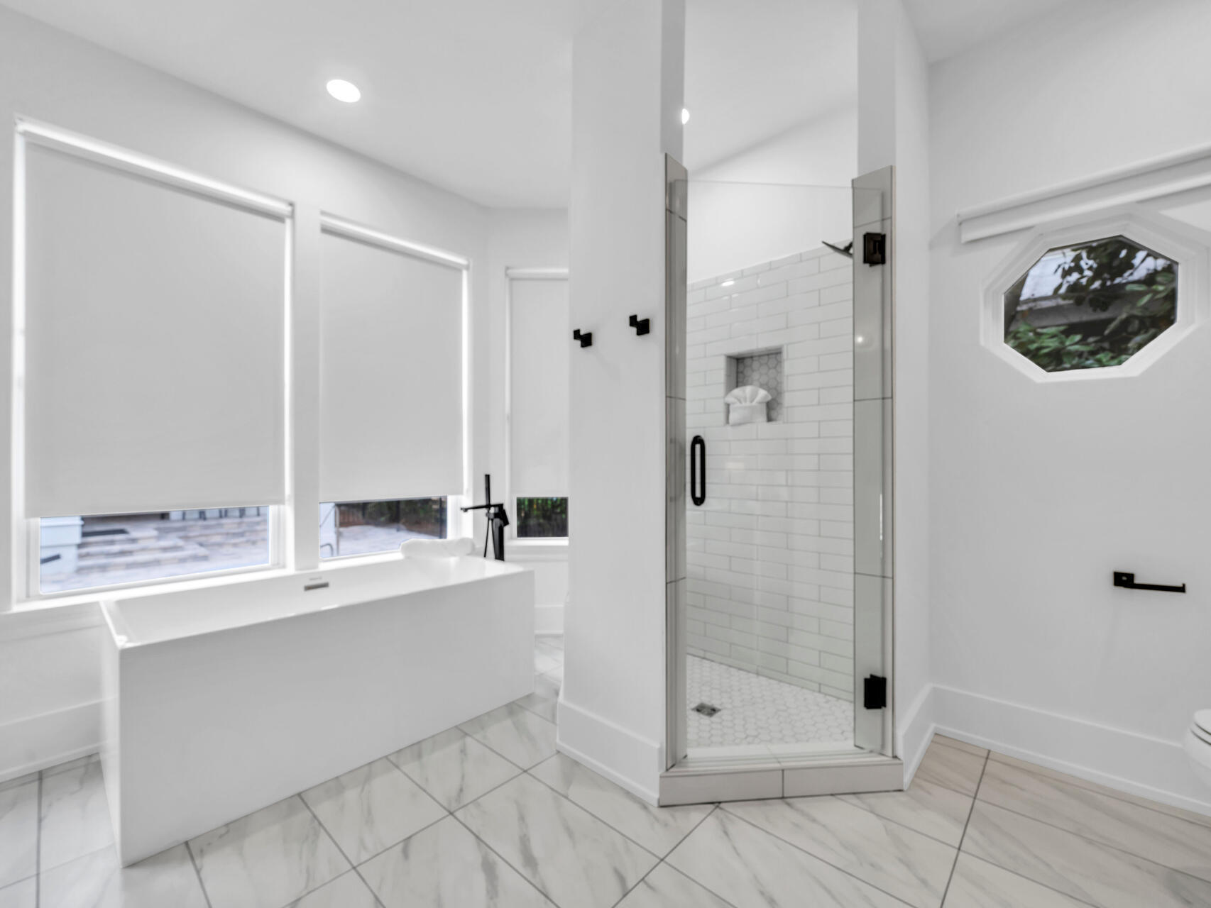 84 Mark Street Destin, FL 32541 - Photo 26 of 81 a bathroom with a granite countertop sink a shower and a mirror