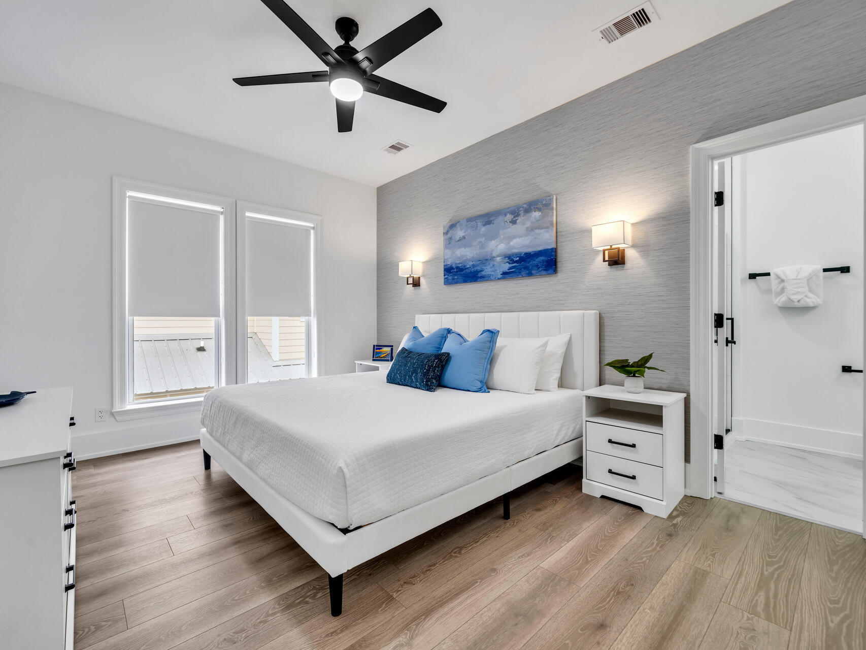 84 Mark Street Destin, FL 32541 - Photo 36 of 81 a bedroom with a large bed and a window