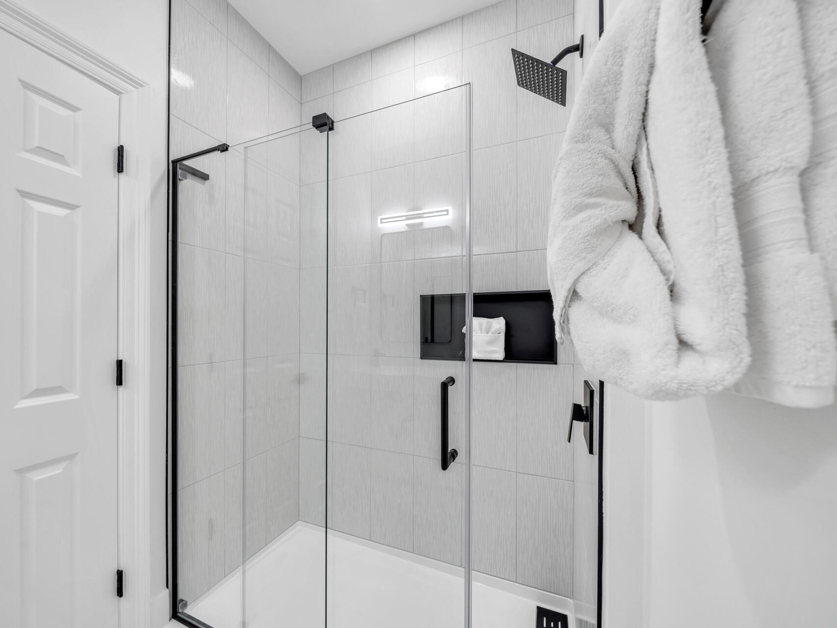 84 Mark Street Destin, FL 32541 - Photo 39 of 81 a bathroom with a shower and a tub