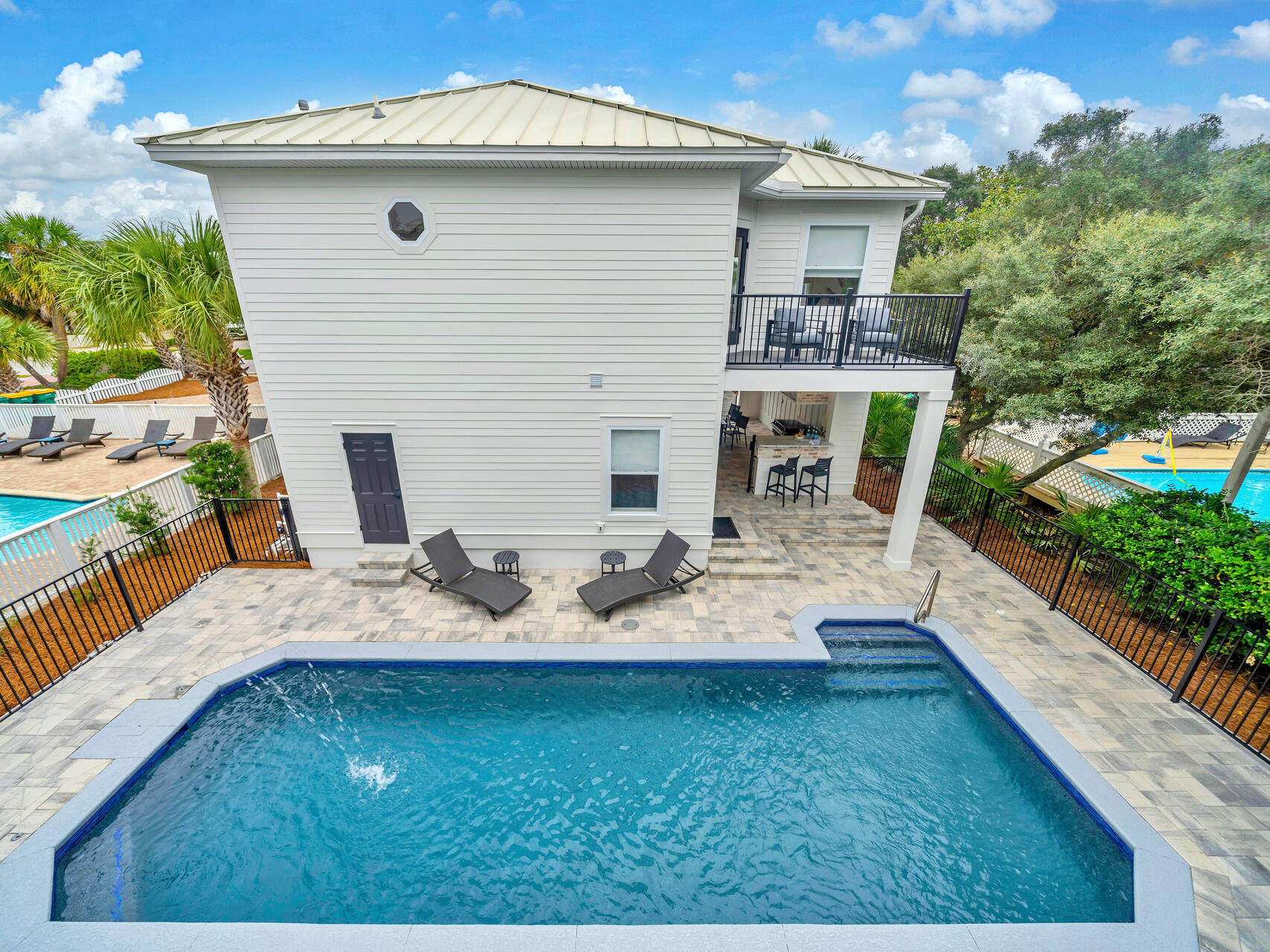 84 Mark Street Destin, FL 32541 - Photo 47 of 81 a view of a house with backyard and sitting area