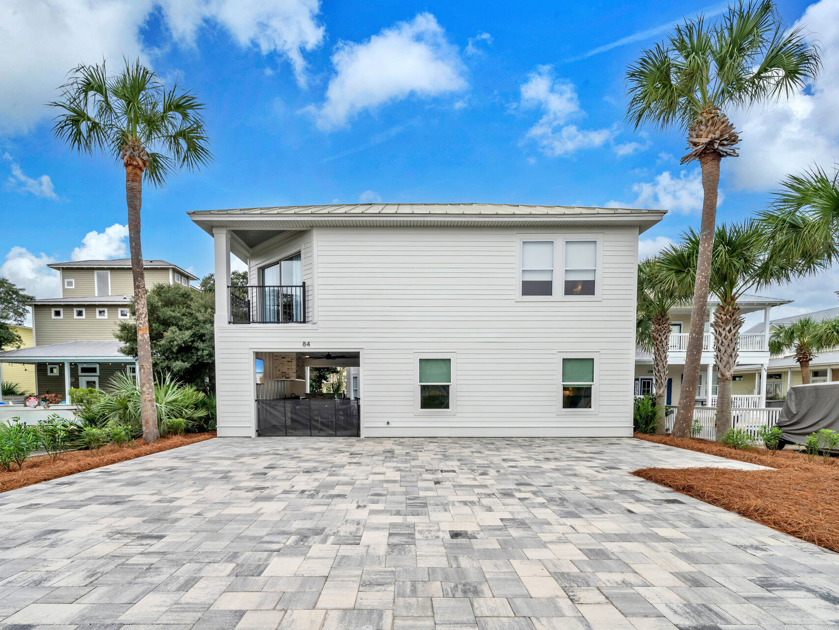 84 Mark Street Destin, FL 32541 - Photo 49 of 81 a house view with a garden space
