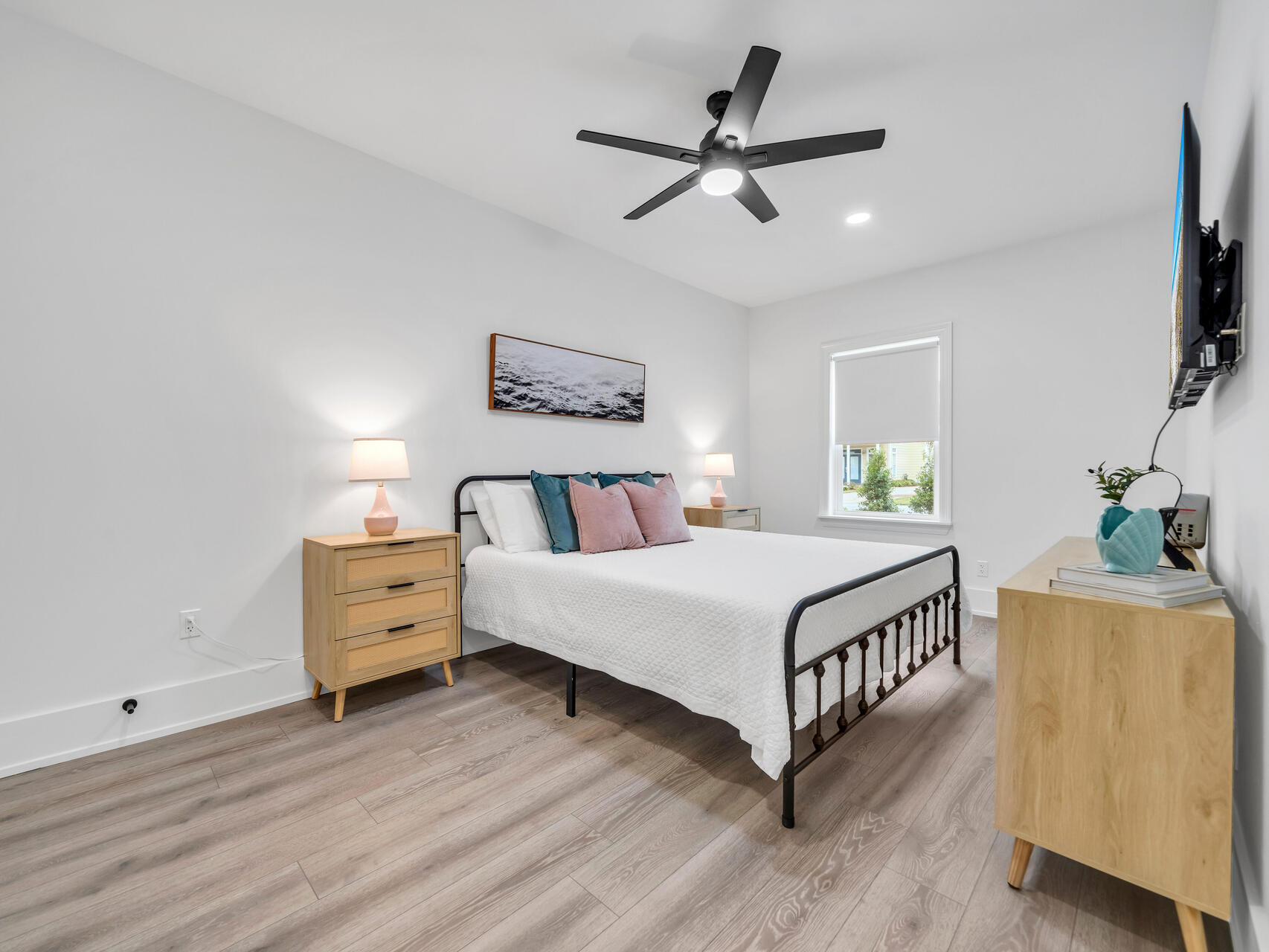 84 Mark Street Destin, FL 32541 - Photo 59 of 81 a bed room with furniture and a window