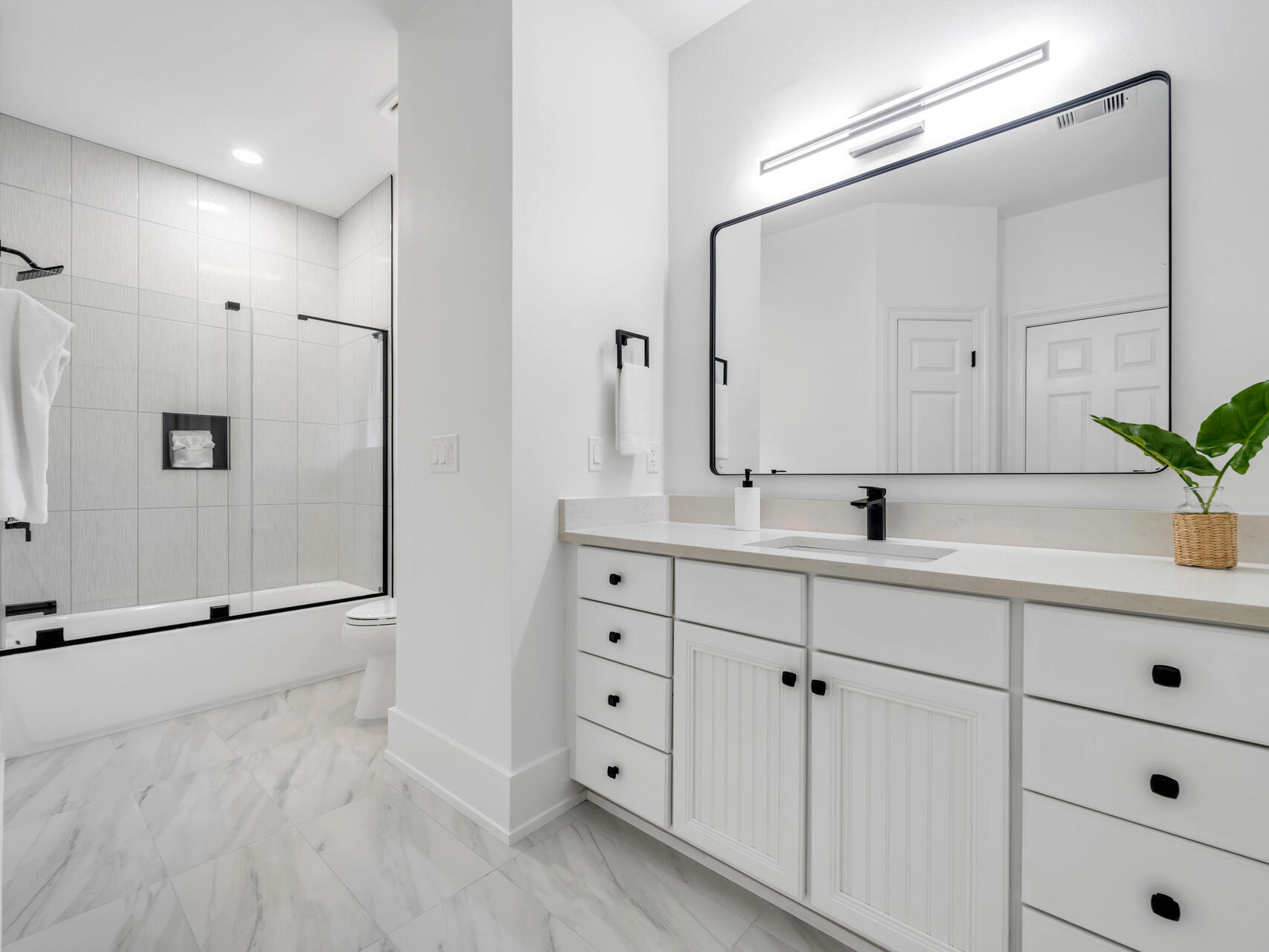 84 Mark Street Destin, FL 32541 - Photo 74 of 81 a bathroom with a double vanity sink mirror and shower