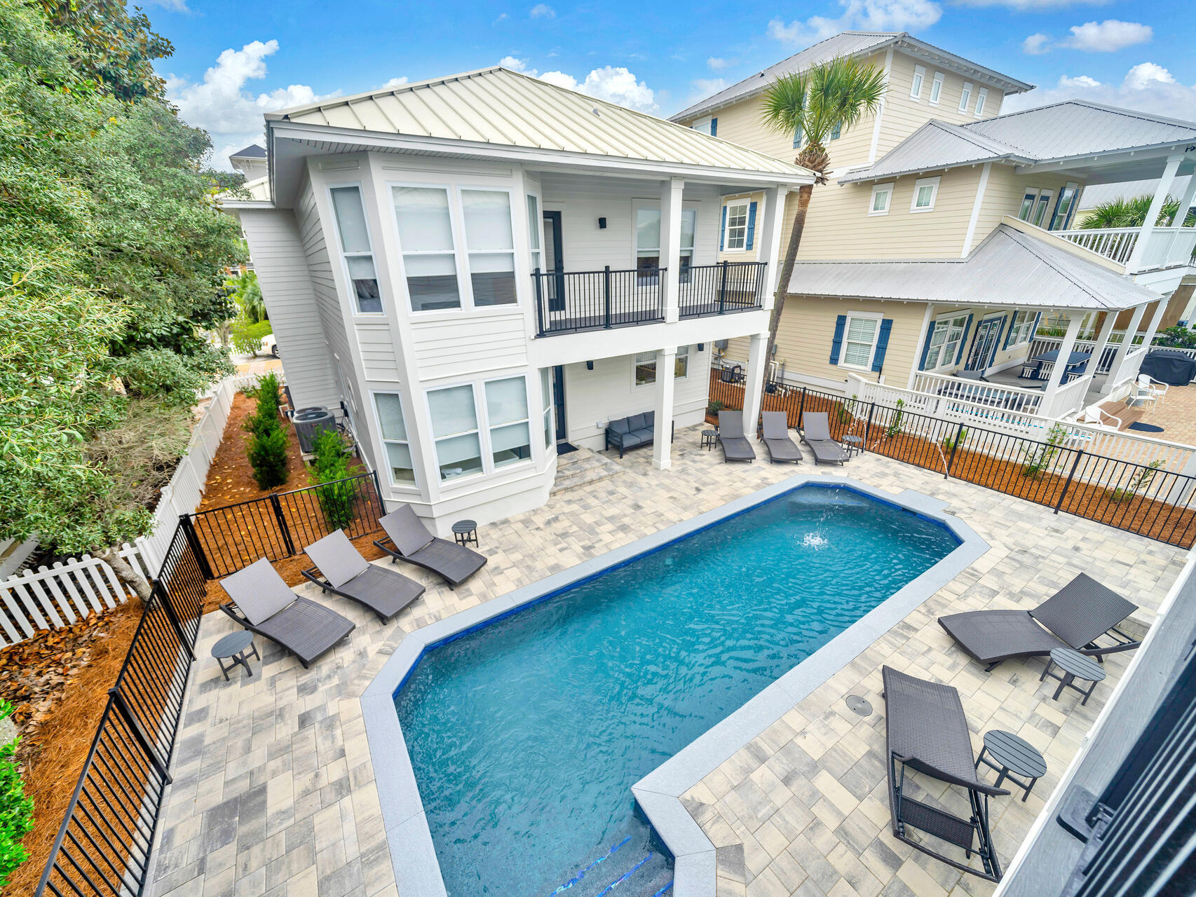 84 Mark Street Destin, FL 32541 - Photo 78 of 81 a view of an outdoor space yard swimming pool and furniture