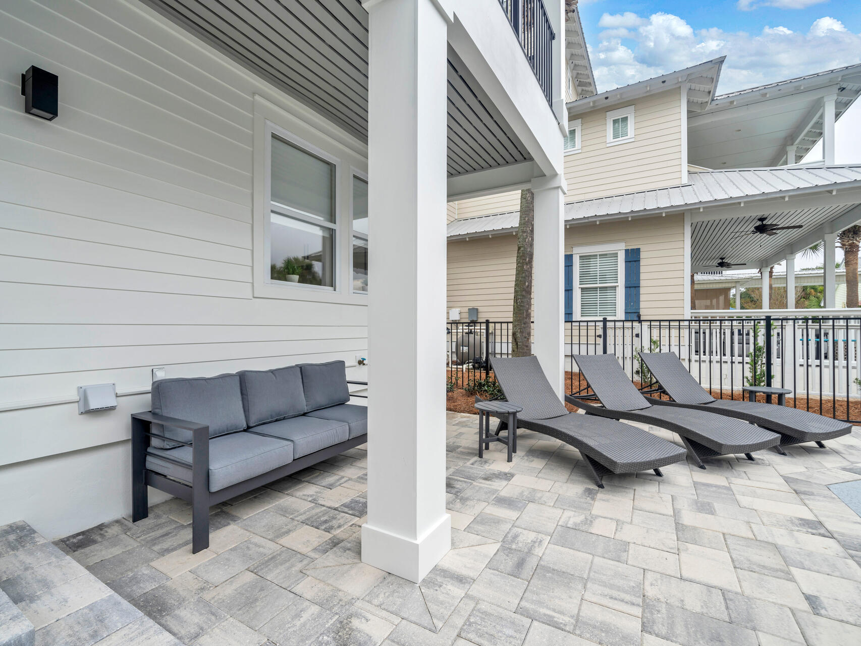 84 Mark Street Destin, FL 32541 - Photo 81 of 81 a view of a patio with a table and chairs