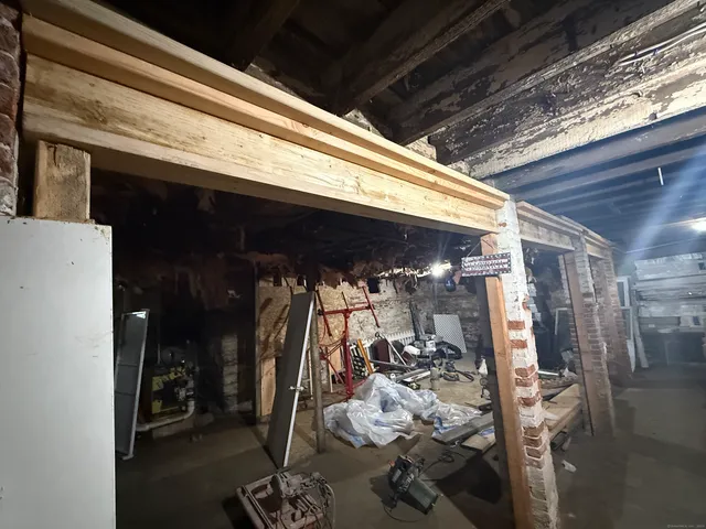 a refrigerator freezer sitting inside of a kitchen