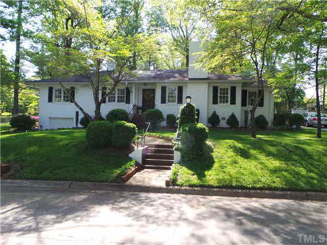 From the street, this shows the front of this beautiful all brick ranch home. The shrubs were all replaced in the recent past. All windows in the main level have been replaced with double-hung replacement windows. It was recently repainted outside.