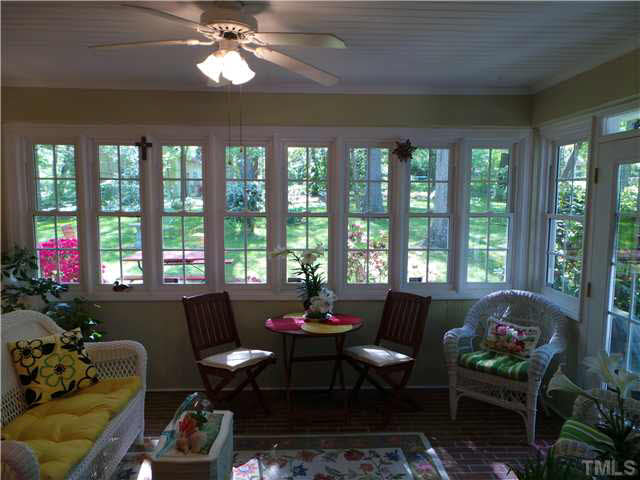 101 Forest Road Oxford, NC 27565 - Photo 19 of 25 From the Dining Room, this is another view of the Sun Room. Note the brick floors and brightness from all the windows. All of the windows are double-hung replacement windows, which adds to the comfort of the room. Also, a great room to have lunch.