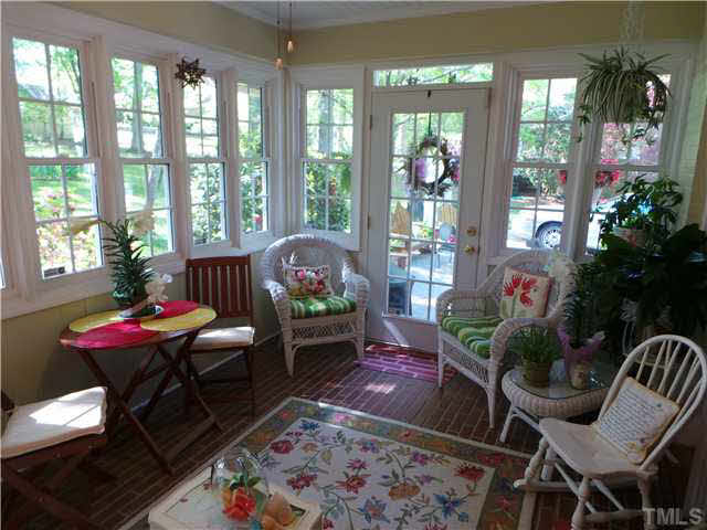 101 Forest Road Oxford, NC 27565 - Photo 20 of 25 This shows the doorway to the Patio from the Sun Room. There is a white, lighted ceiling fan in this room. The Sun Room is also a nice room for plants to grow year around.