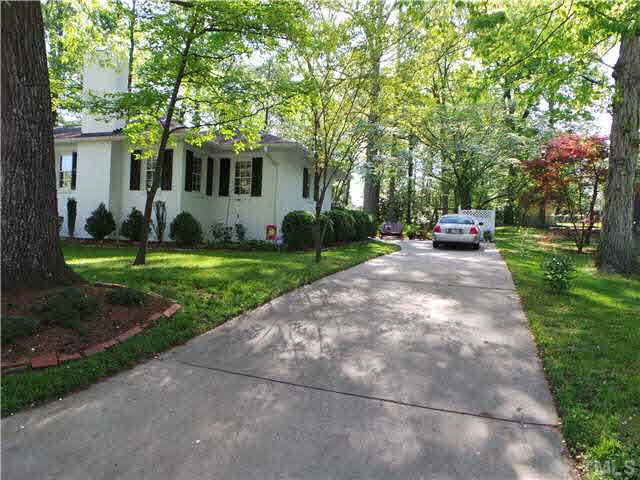101 Forest Road Oxford, NC 27565 - Photo 25 of 25 This shows the driveway to the right of the house with the Patio at the top of the driveway. As with the other driveway, this provides additional off-street parking for your guests.