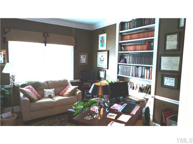 101 Forest Road Oxford, NC 27565 - Photo 9 of 25 This view of the Library/Study is from the hallway. Note that the room is light and bright. All windows on this level have been replaced with energy efficient double-hung windows.
