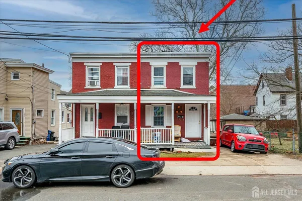 a car parked in front of a building