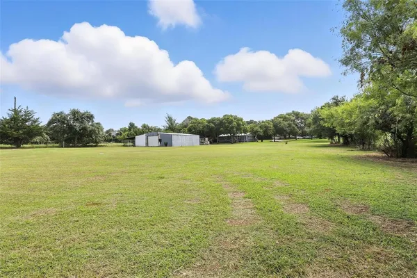 a view of yard with ocean view