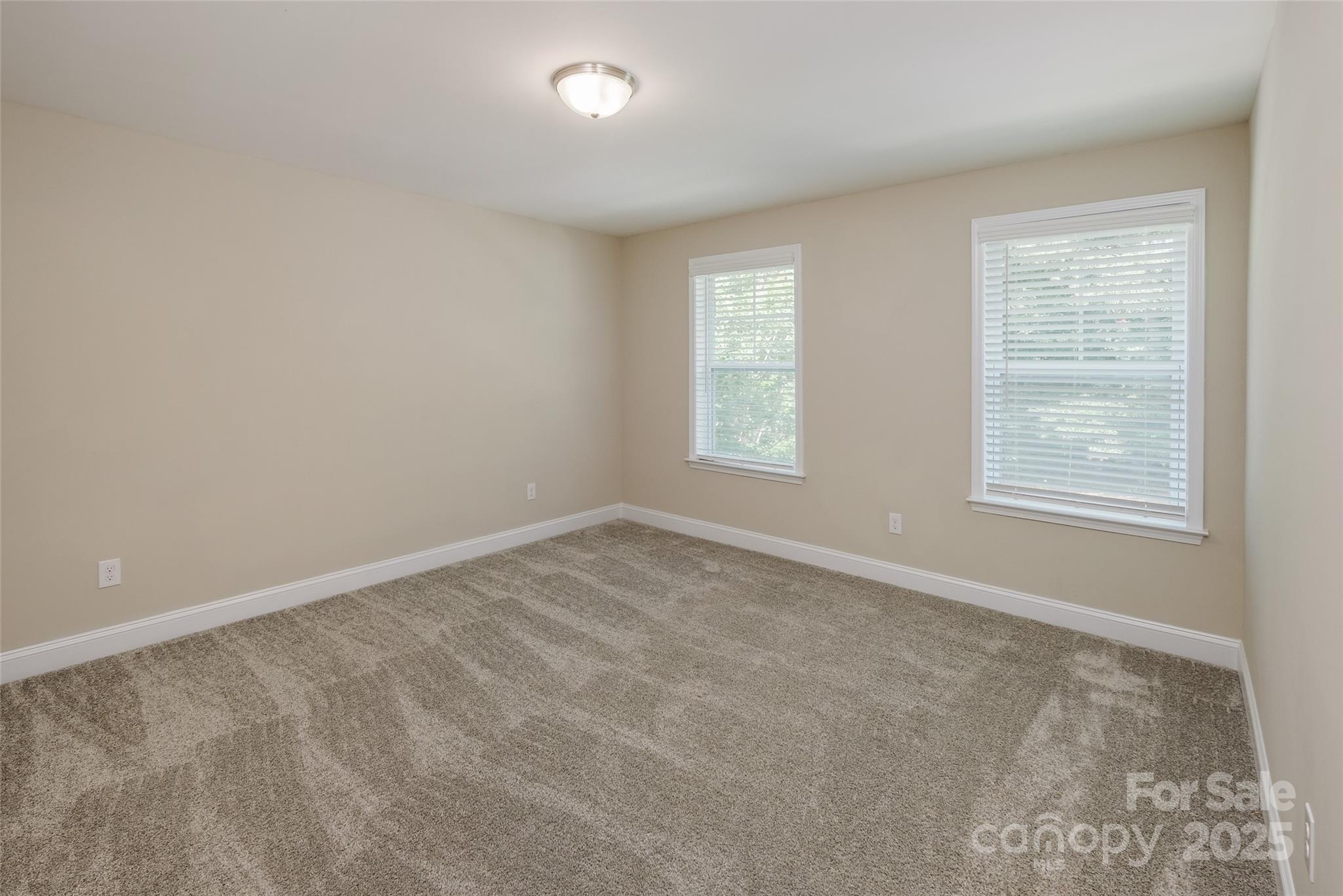 707 Marion Drive Matthews, NC 28105 - Photo 23 of 30 an empty room with a window