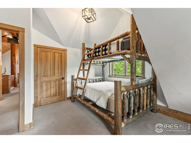 a view of a hallway with staircase