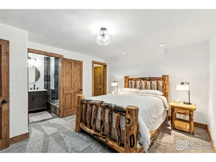 a living room with furniture a rug and a piano