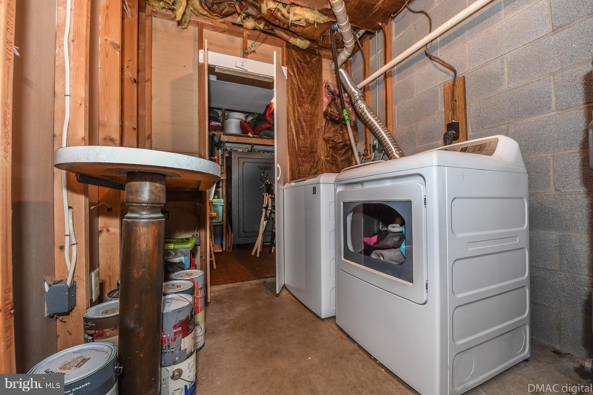 13230 Independence Road Clear Spring, MD 21722 - Photo 20 of 30 a view of a hallway with washer and dryer
