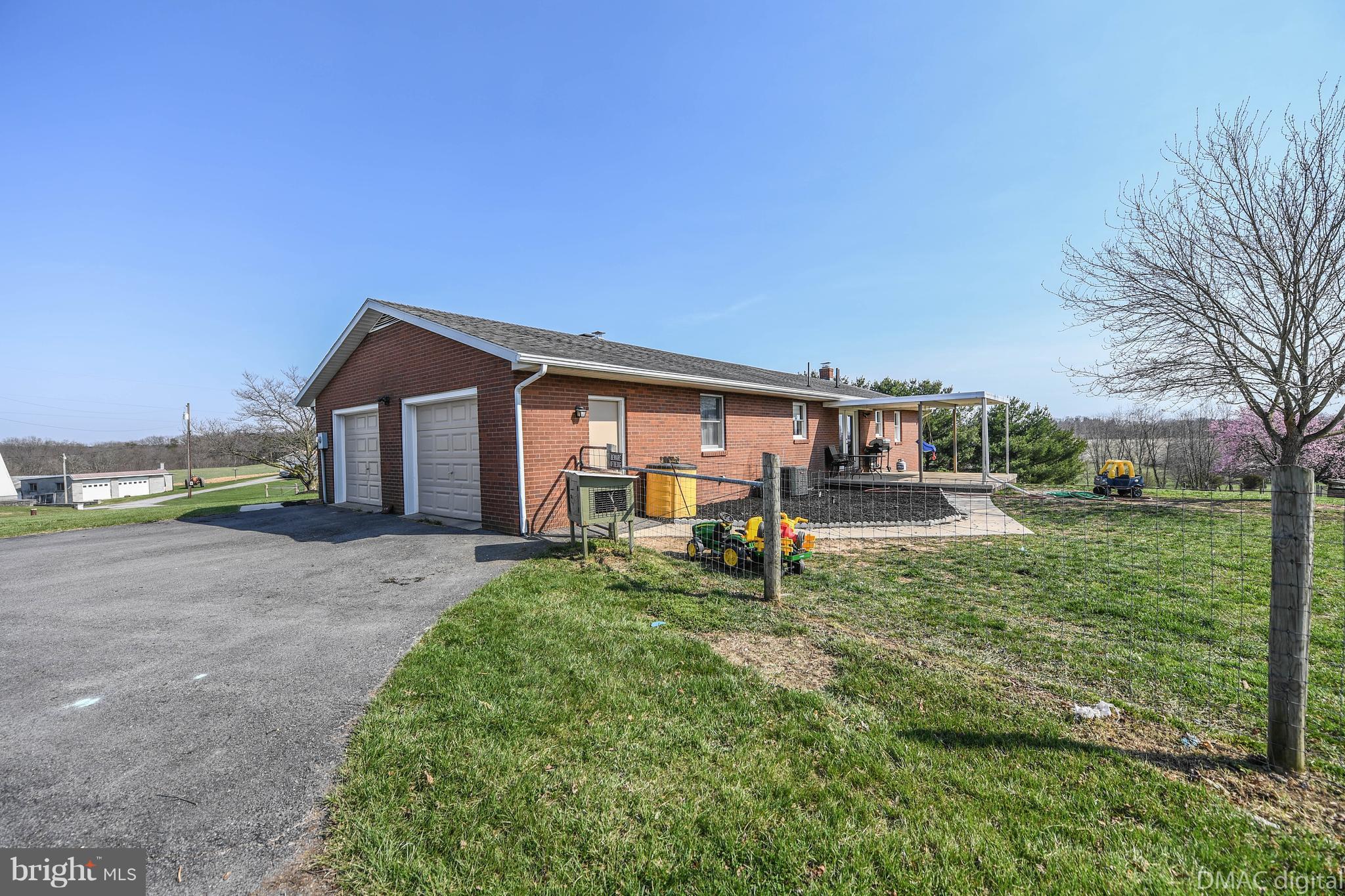13230 Independence Road Clear Spring, MD 21722 - Photo 29 of 30 a view of a house with backyard porch and garden