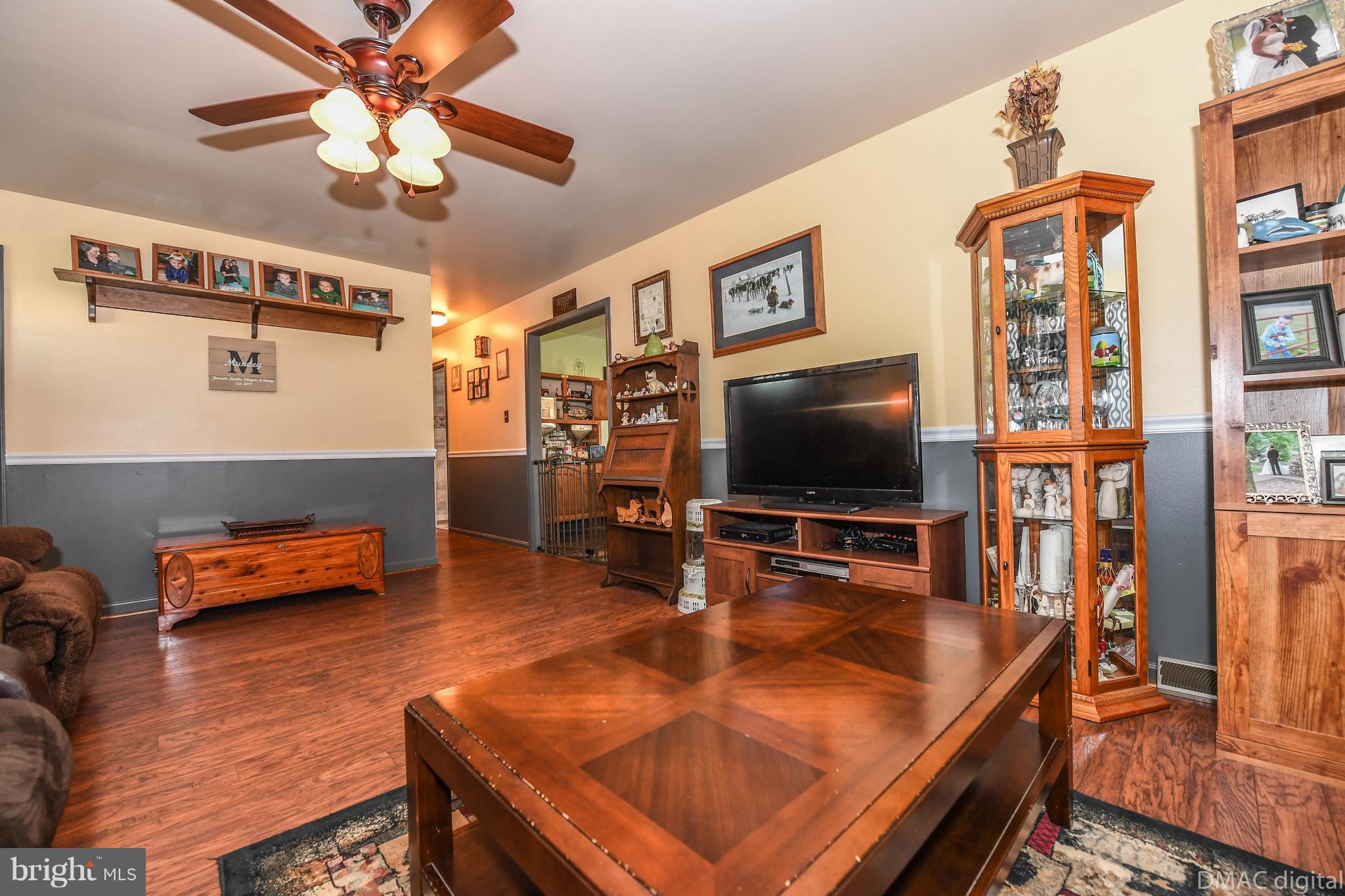 13230 Independence Road Clear Spring, MD 21722 - Photo 6 of 30 a living room with furniture and a flat screen tv
