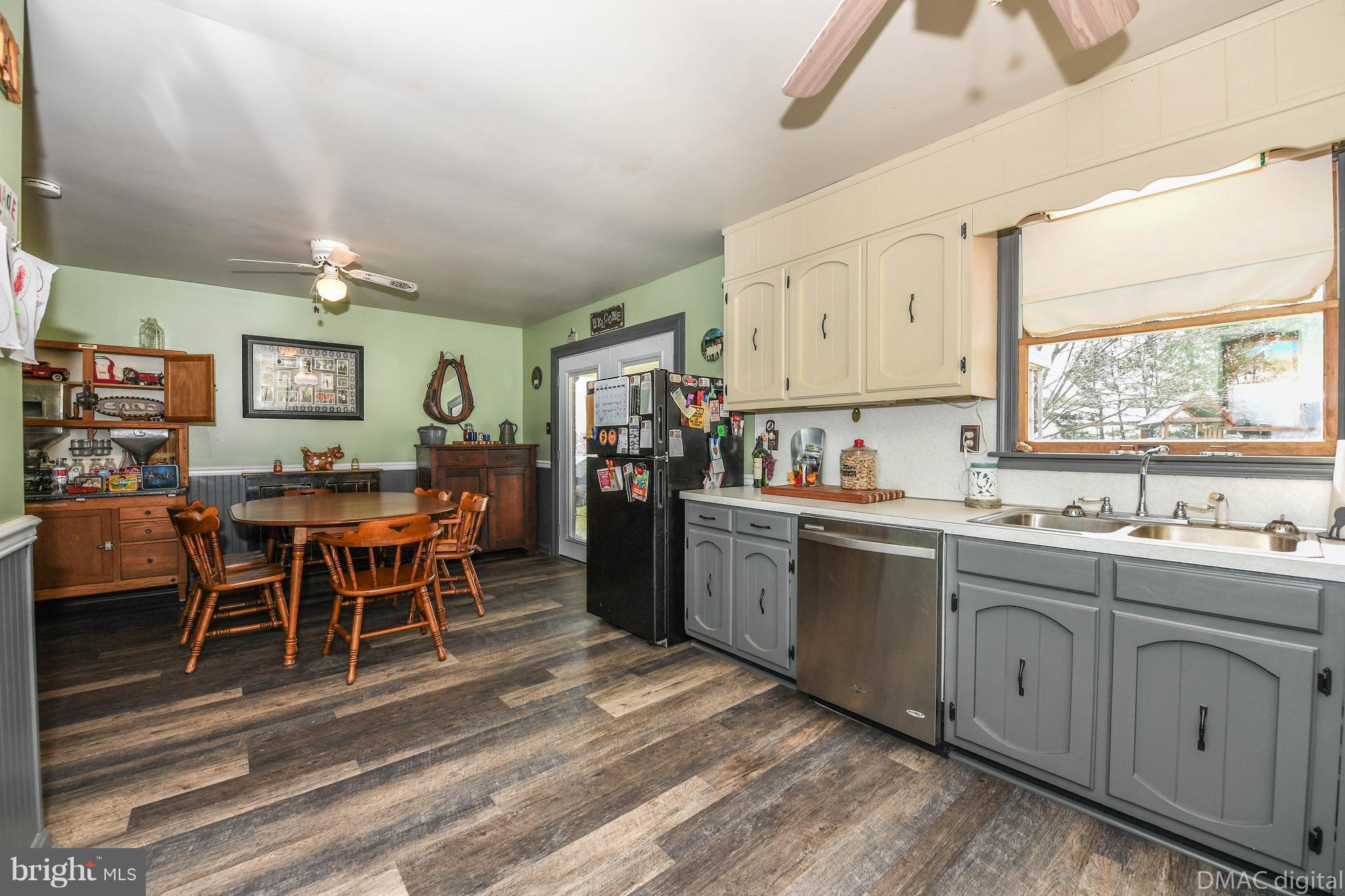 13230 Independence Road Clear Spring, MD 21722 - Photo 8 of 30 a kitchen with lots of counter top space and dining table