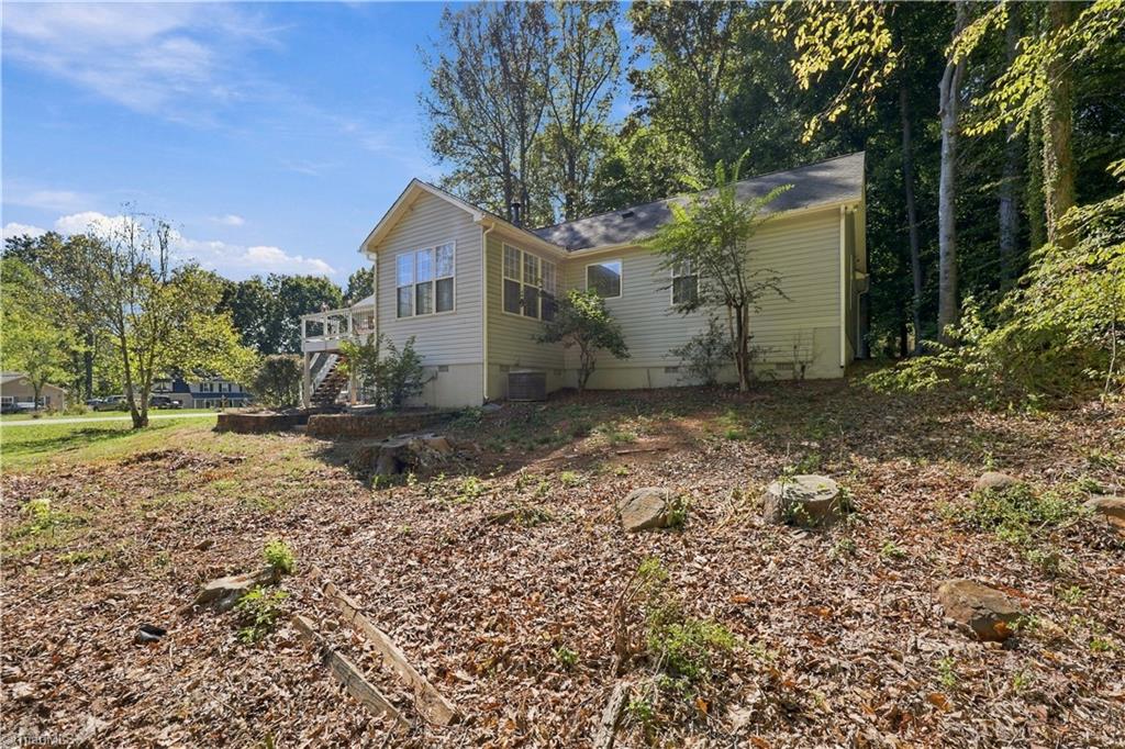 7500 Bartonshire Court Oak Ridge, NC 27310 - Photo 42 of 49 Side view of house