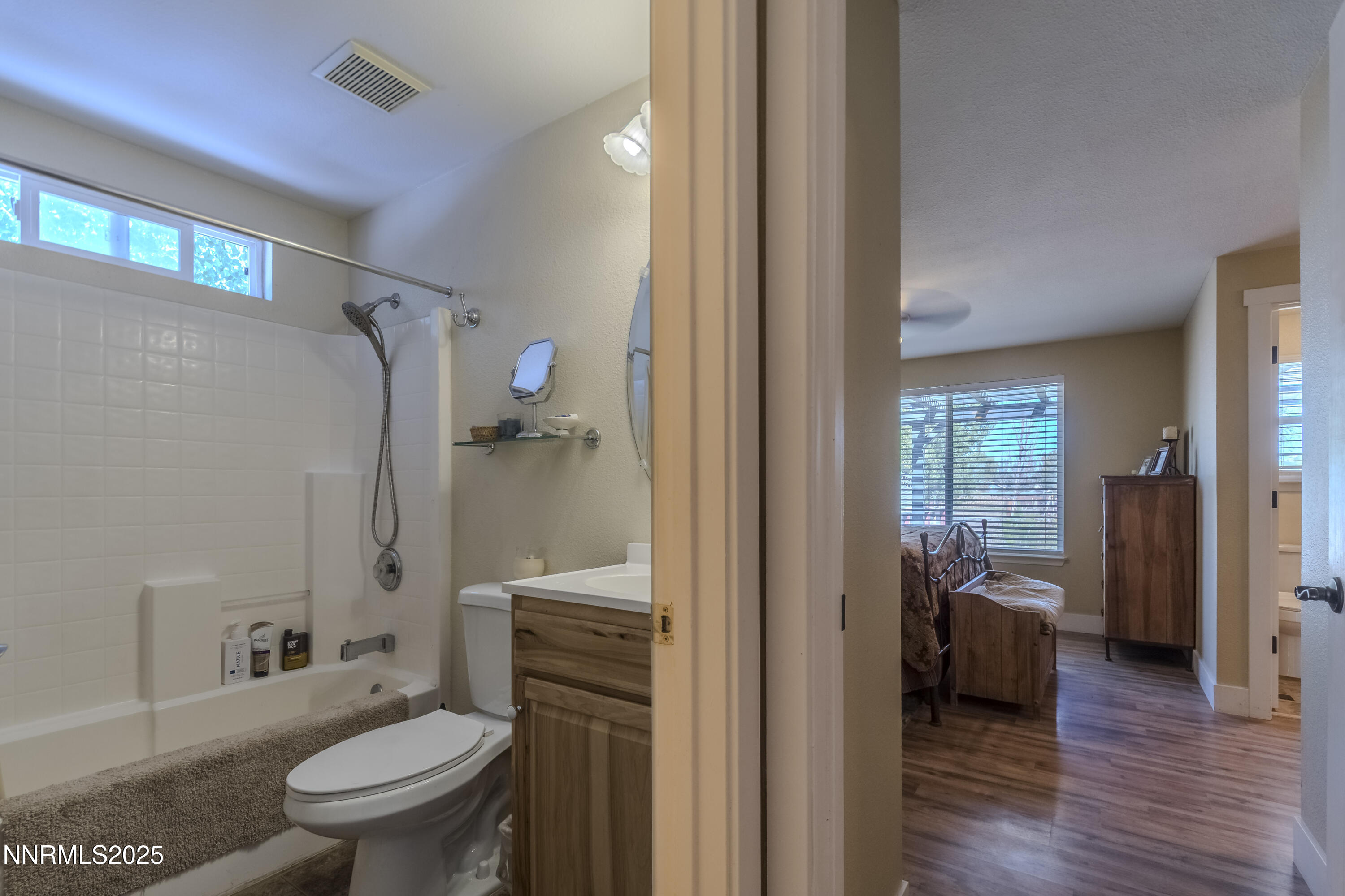 4190 Bottom Road Fallon, NV 89406 - Photo 14 of 44 a bathroom with a toilet a sink and a shower