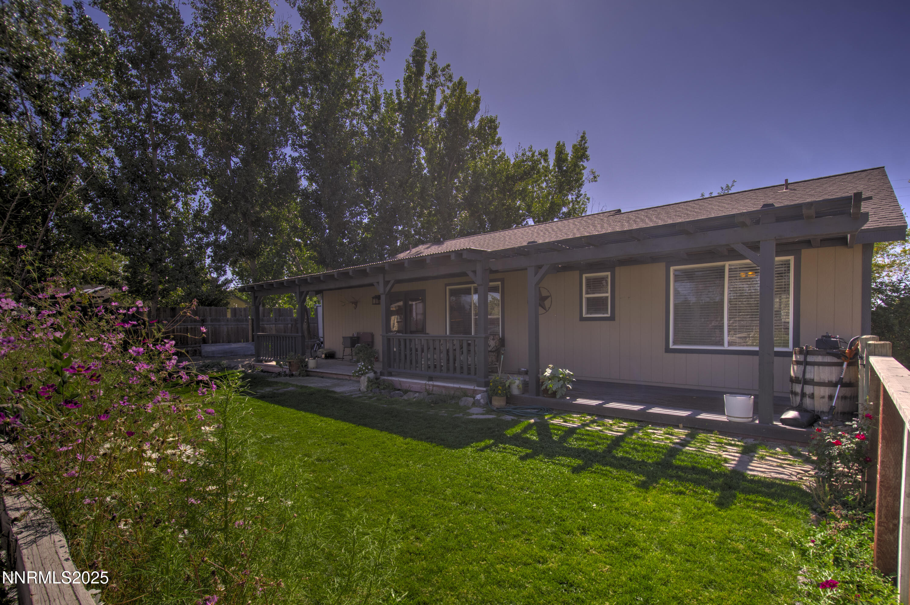 4190 Bottom Road Fallon, NV 89406 - Photo 23 of 44 a view of a house with a yard patio and a tree