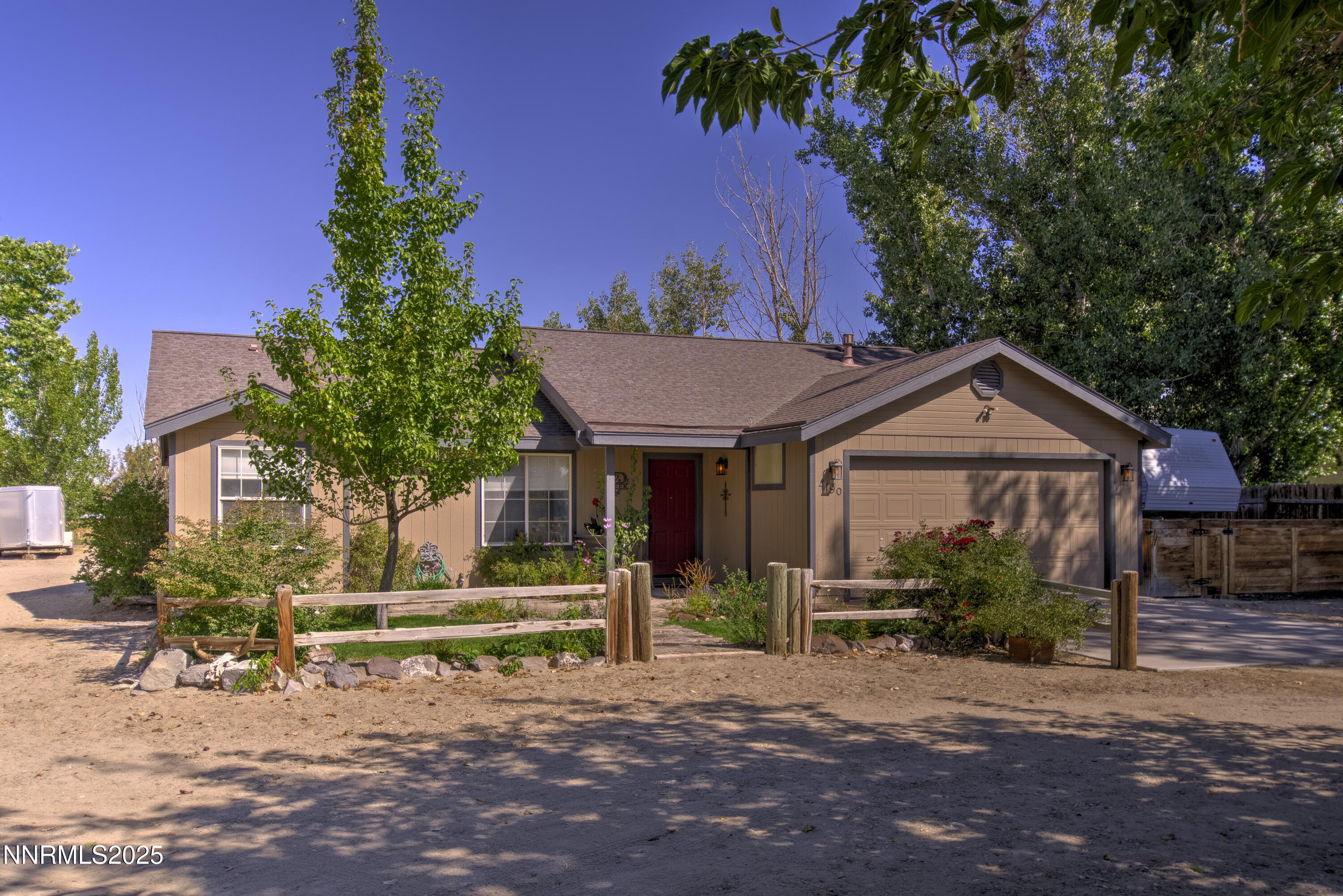 4190 Bottom Road Fallon, NV 89406 - Photo 29 of 44 a front view of a house with garden