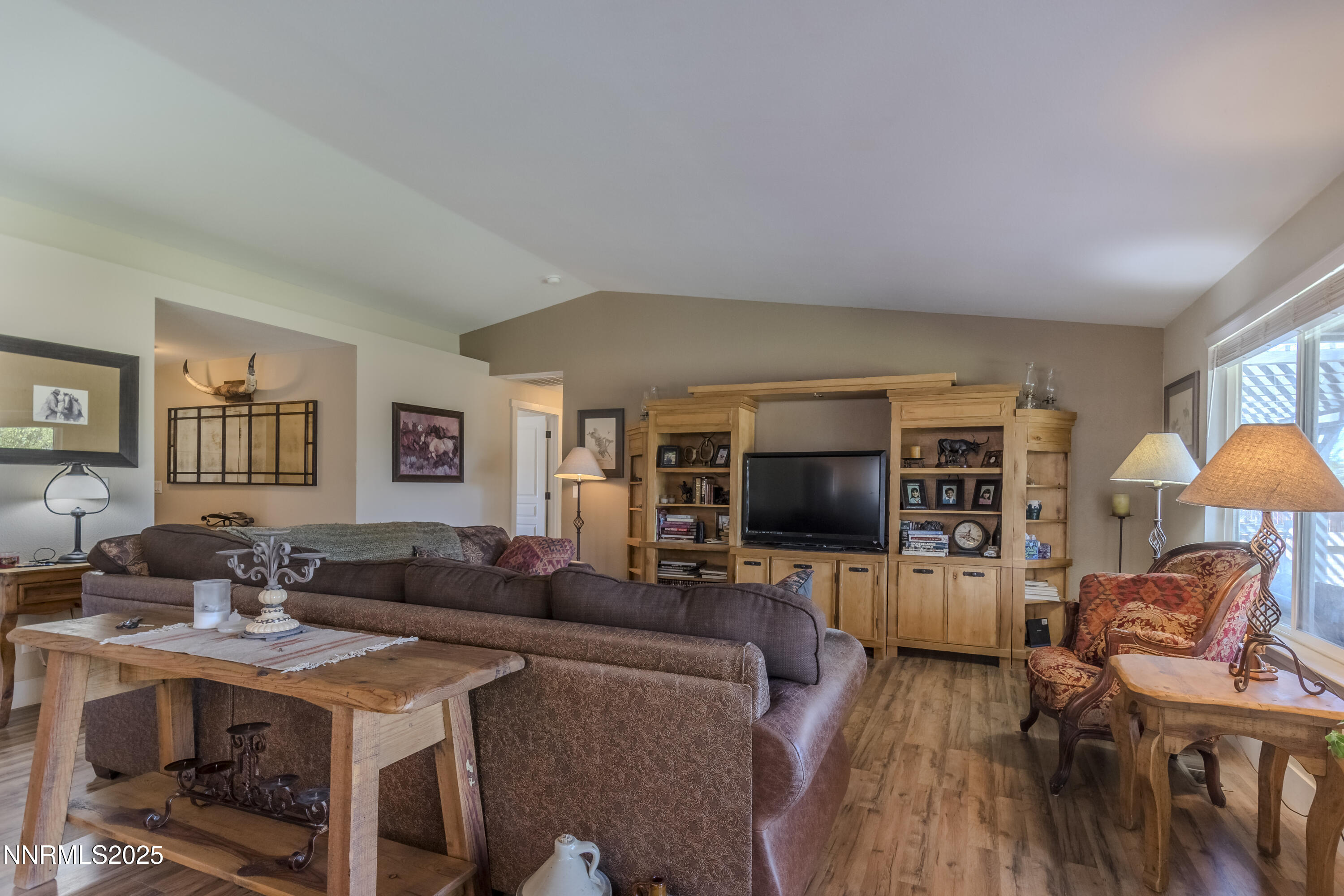 4190 Bottom Road Fallon, NV 89406 - Photo 3 of 44 a living room with furniture a flat screen tv and a dining table