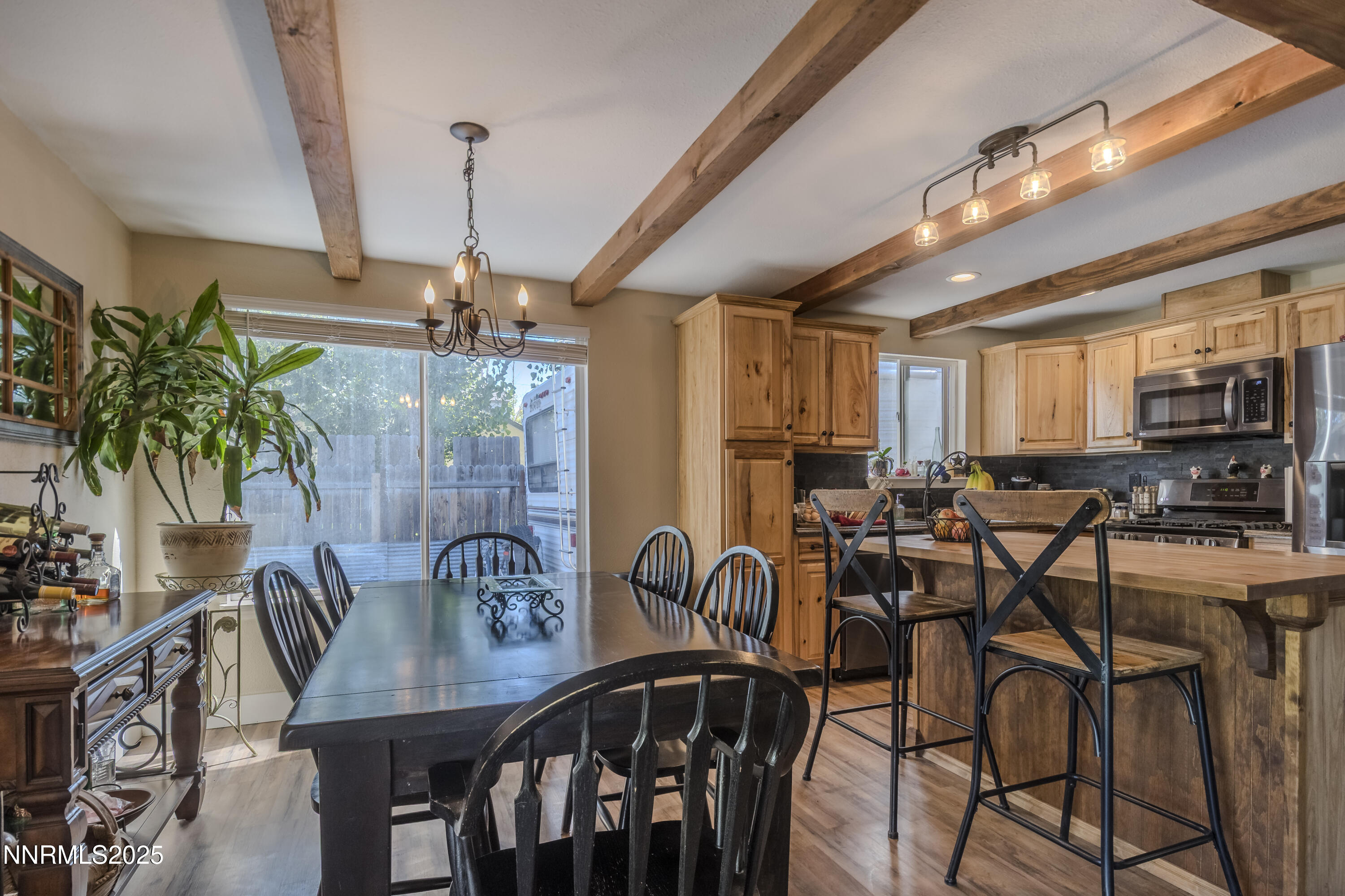 4190 Bottom Road Fallon, NV 89406 - Photo 5 of 44 a view of a dining room with furniture window and wooden floor