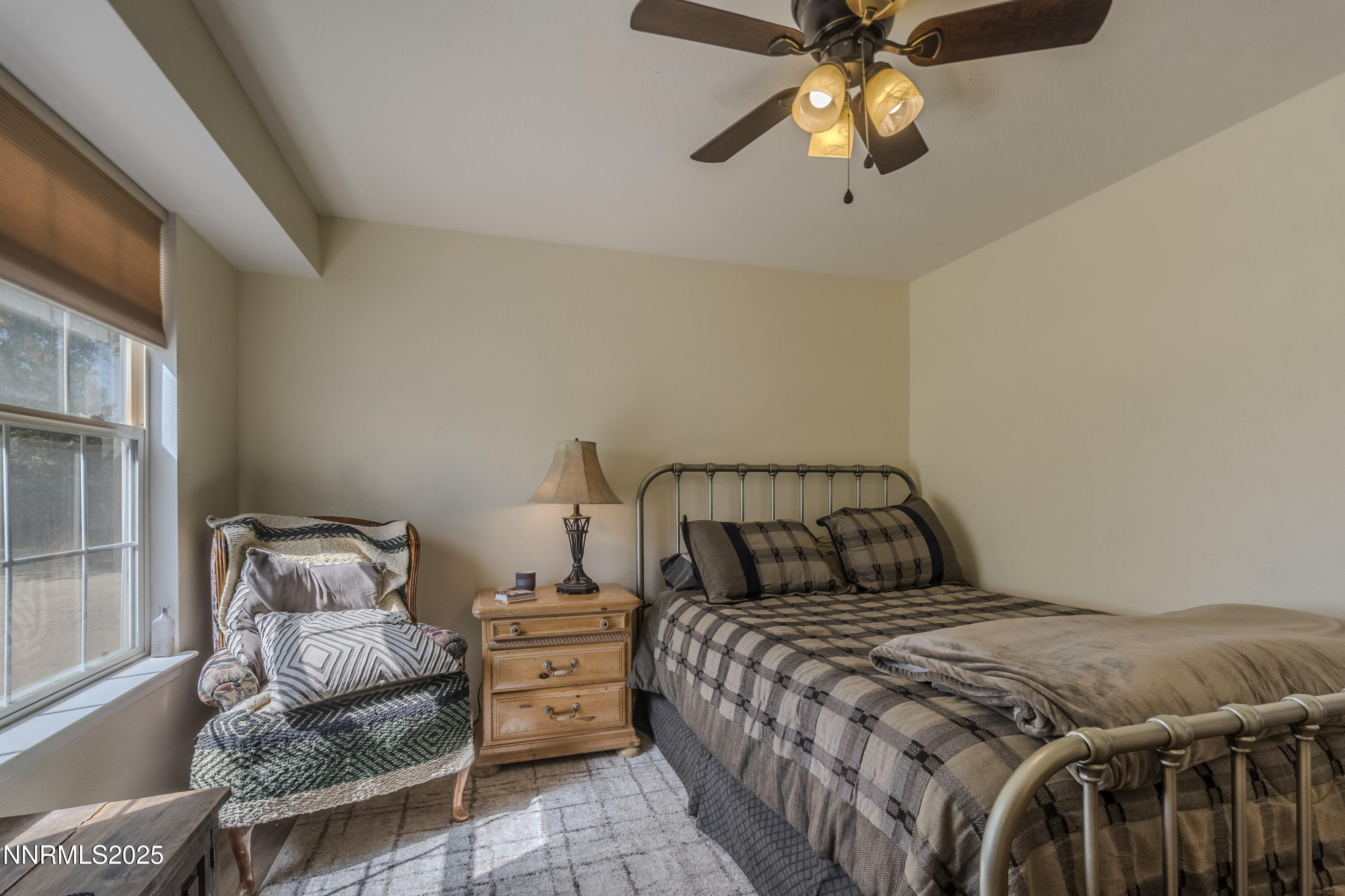 4190 Bottom Road Fallon, NV 89406 - Photo 10 of 44 a bedroom with a bed and window