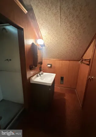 a bathroom with a toilet and a sink