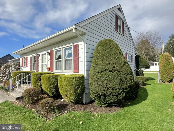 a view of a house with a garden