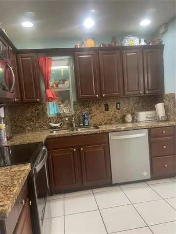 $599,990 | 7551 Southwest 42nd Place, Davie, FL 33314