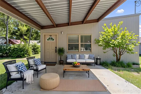 a outdoor living space with furniture and garden view