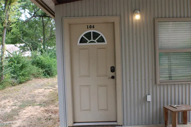 a front view of a house with yard