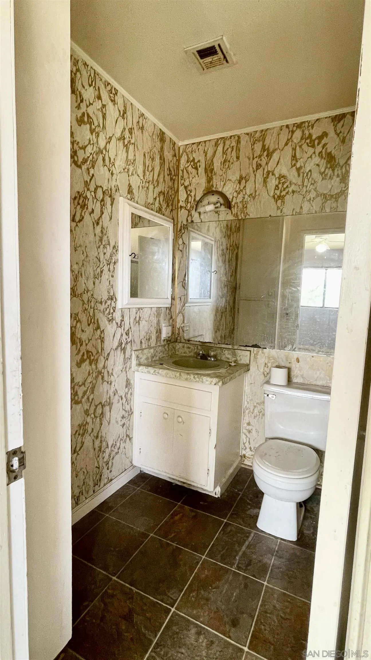 764 Surrey Trail Julian, CA 92036 - Photo 12 of 15 a bathroom with a sink a toilet and shower