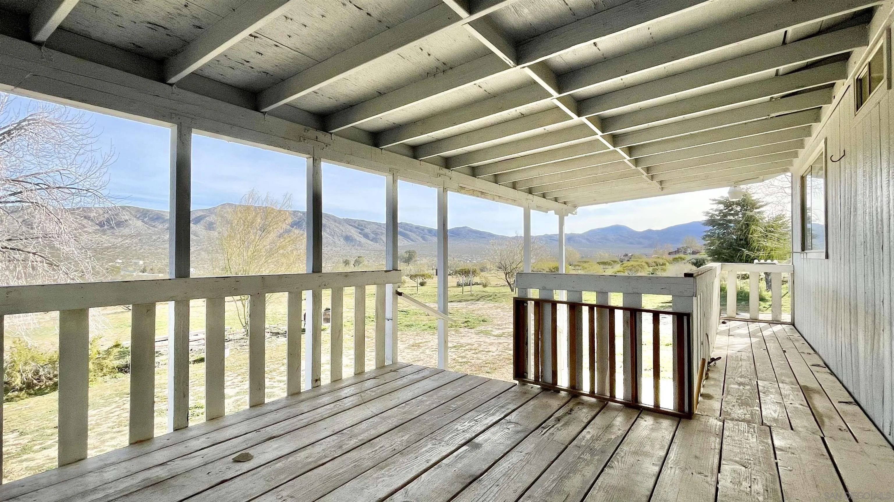 764 Surrey Trail Julian, CA 92036 - Photo 3 of 15 a view of a balcony with wooden floor